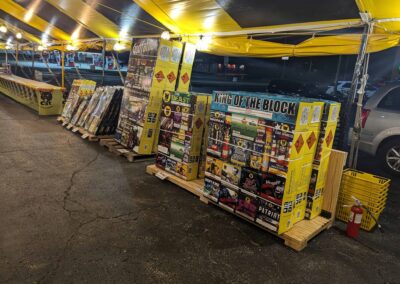 Inside view of a fully stocked fireworks tent, offering a wide selection of fireworks near me in Missouri for 4th of July celebrations.