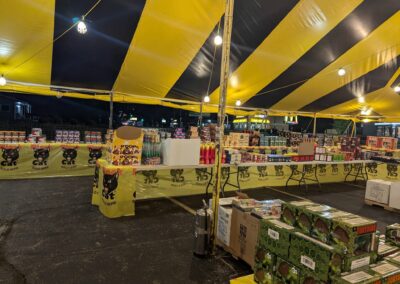 Inside view of a fully stocked fireworks tent, offering a wide selection of fireworks near me in Missouri for 4th of July celebrations.