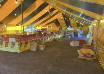 Inside view of a fully stocked fireworks tent, offering a wide selection of fireworks near me in Missouri for 4th of July celebrations.