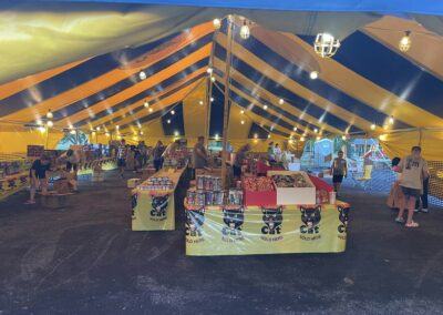 Inside view of a fully stocked fireworks tent, offering a wide selection of fireworks near me in Missouri for 4th of July celebrations.