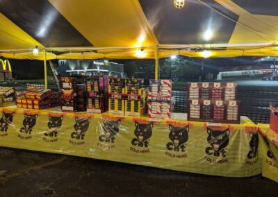 Inside view of a fully stocked fireworks tent, offering a wide selection of fireworks near me in Missouri for 4th of July celebrations.