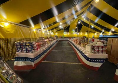 Inside view of a fully stocked fireworks tent, offering a wide selection of fireworks near me in Missouri for 4th of July celebrations.