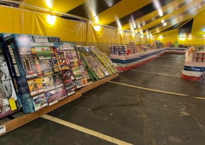 Inside view of a fully stocked fireworks tent, offering a wide selection of fireworks near me in Missouri for 4th of July celebrations.